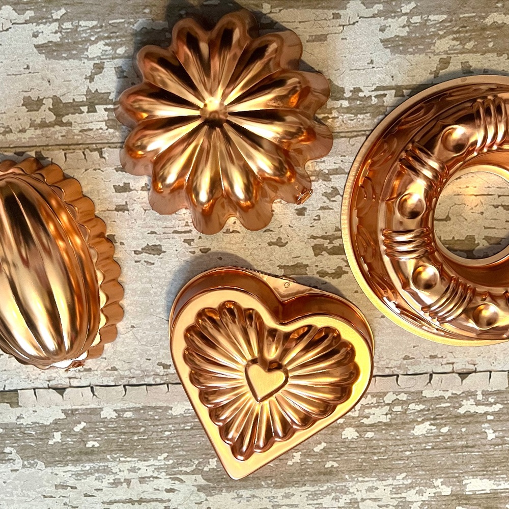 Four stunning vintage copper jello cake molds